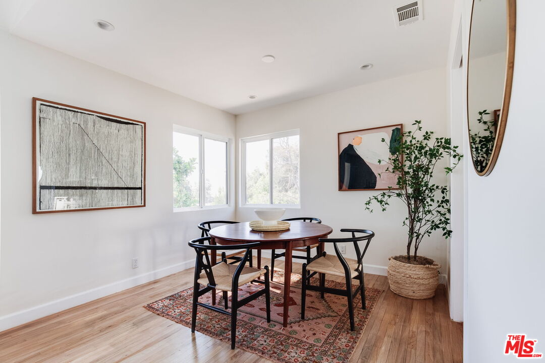 4545 Rising Hill Road Altadena, CA 91001 - Photo 5 of 31 a dining room with furniture and window