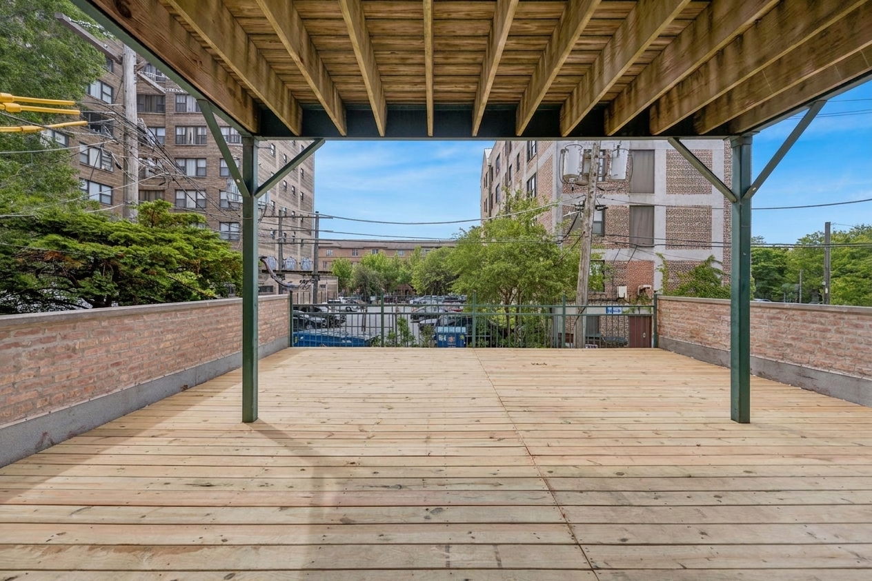 2363 East 70th Street, Unit 1 Chicago, IL 60649 - Photo 25 of 26 a view of a backyard of the house