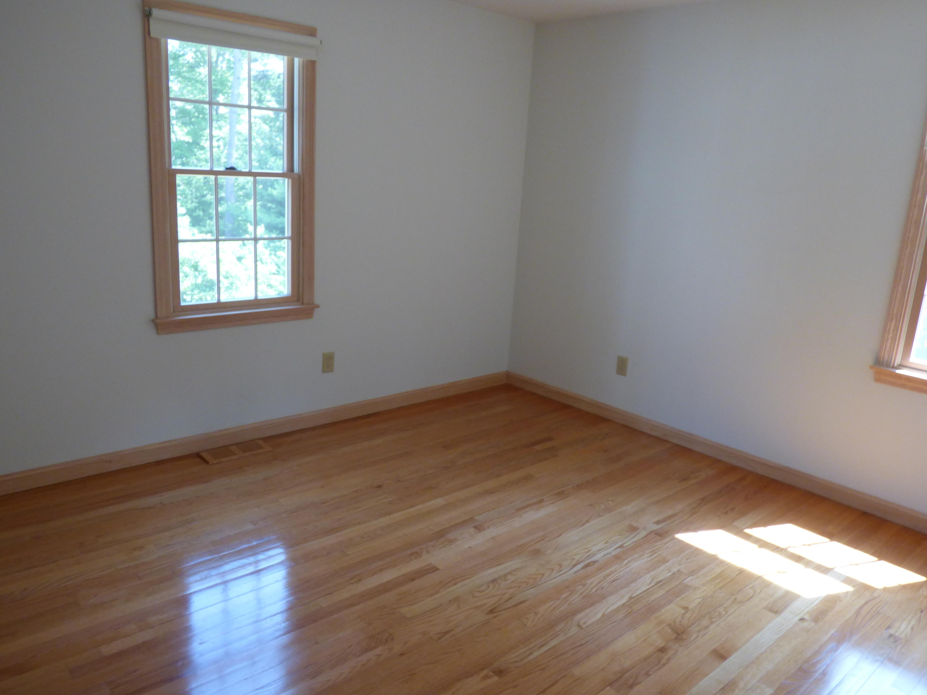 229 Woodside Road West Barnstable, MA 02668 - Photo 11 of 26 a view of a room that has wooden floor and window