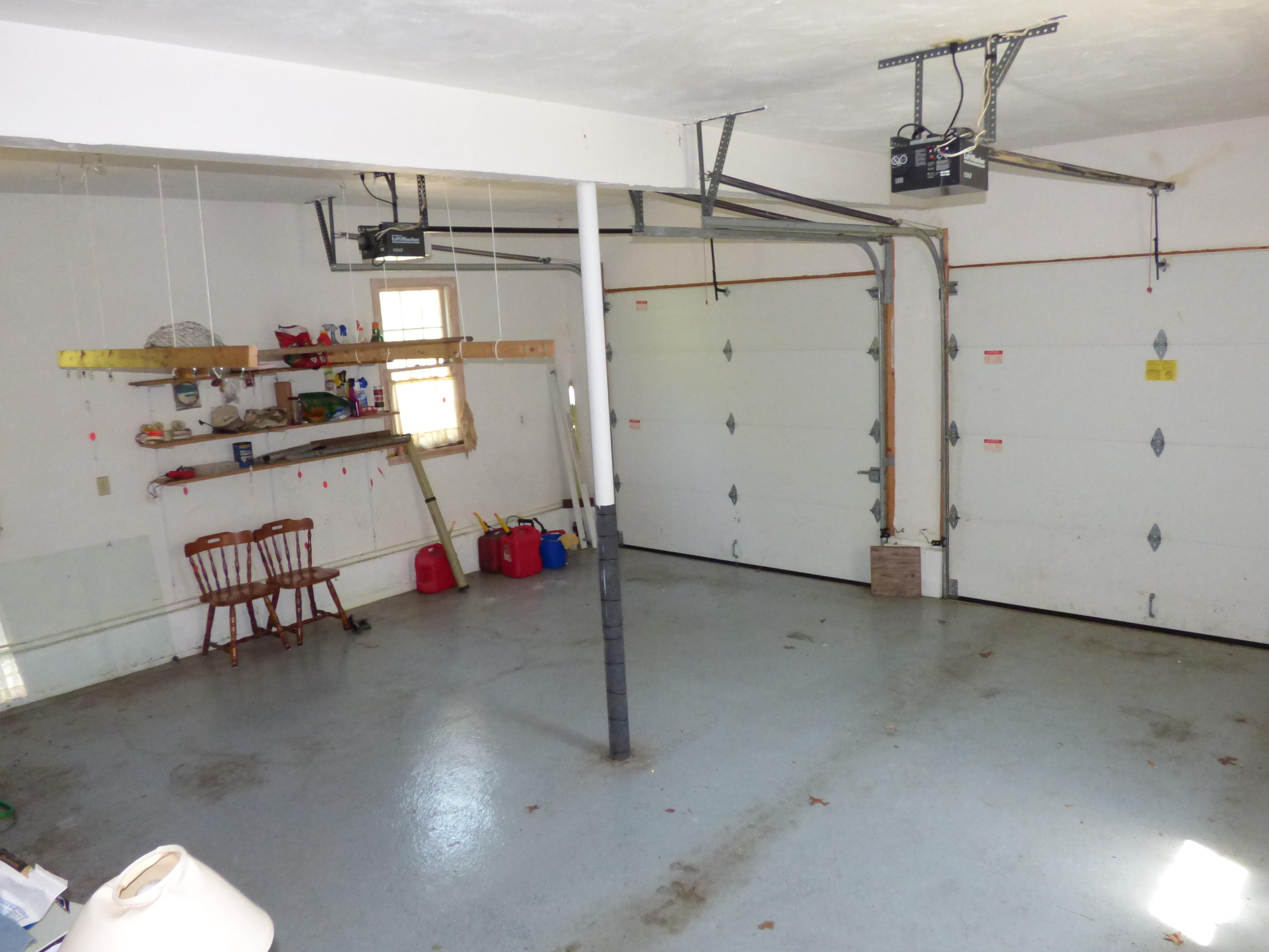 229 Woodside Road West Barnstable, MA 02668 - Photo 17 of 26 a room with gym equipment and white walls