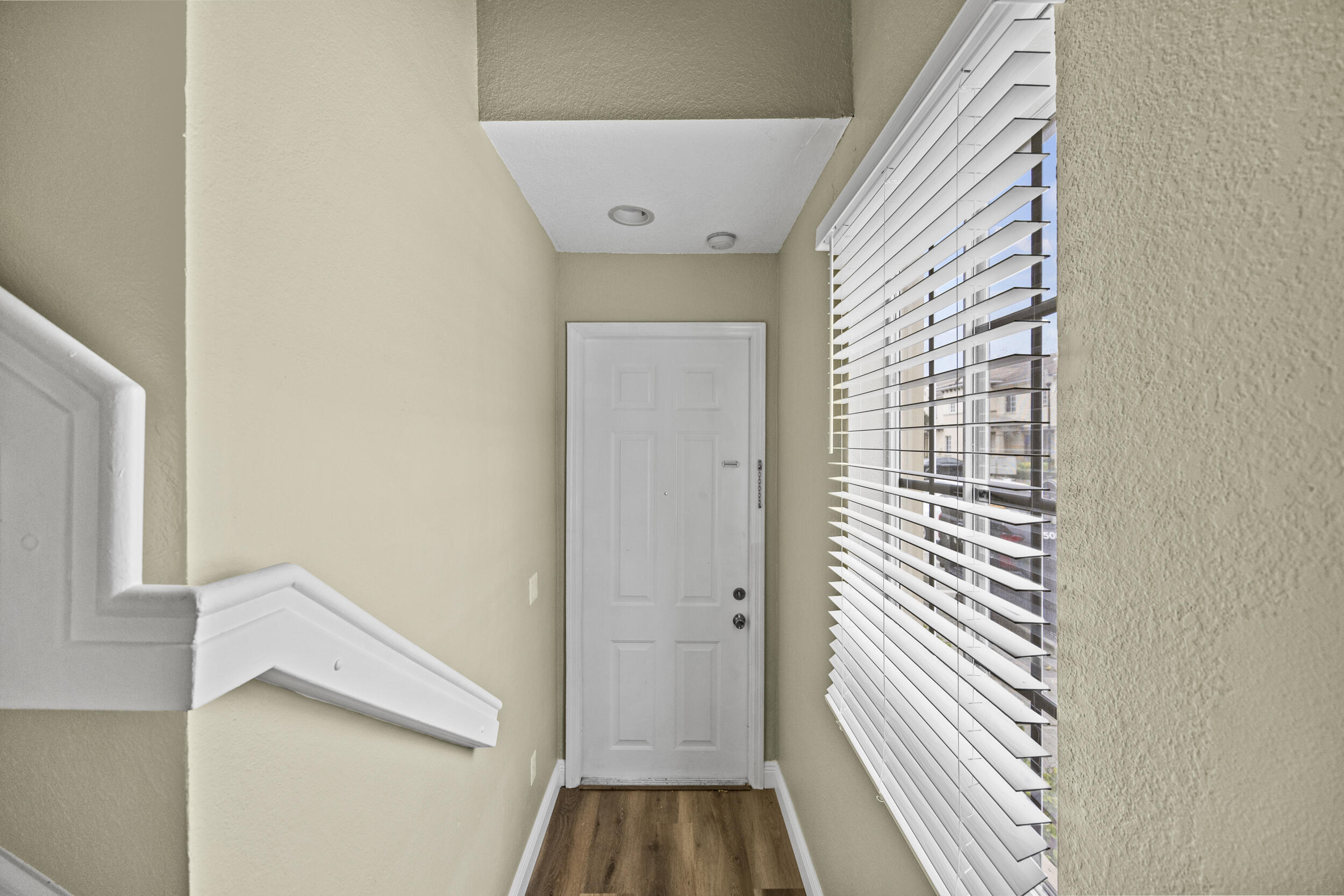 1982 Freeport Drive Riviera Beach, FL 33404 - Photo 27 of 31 a view of bathroom with a sink and mirror