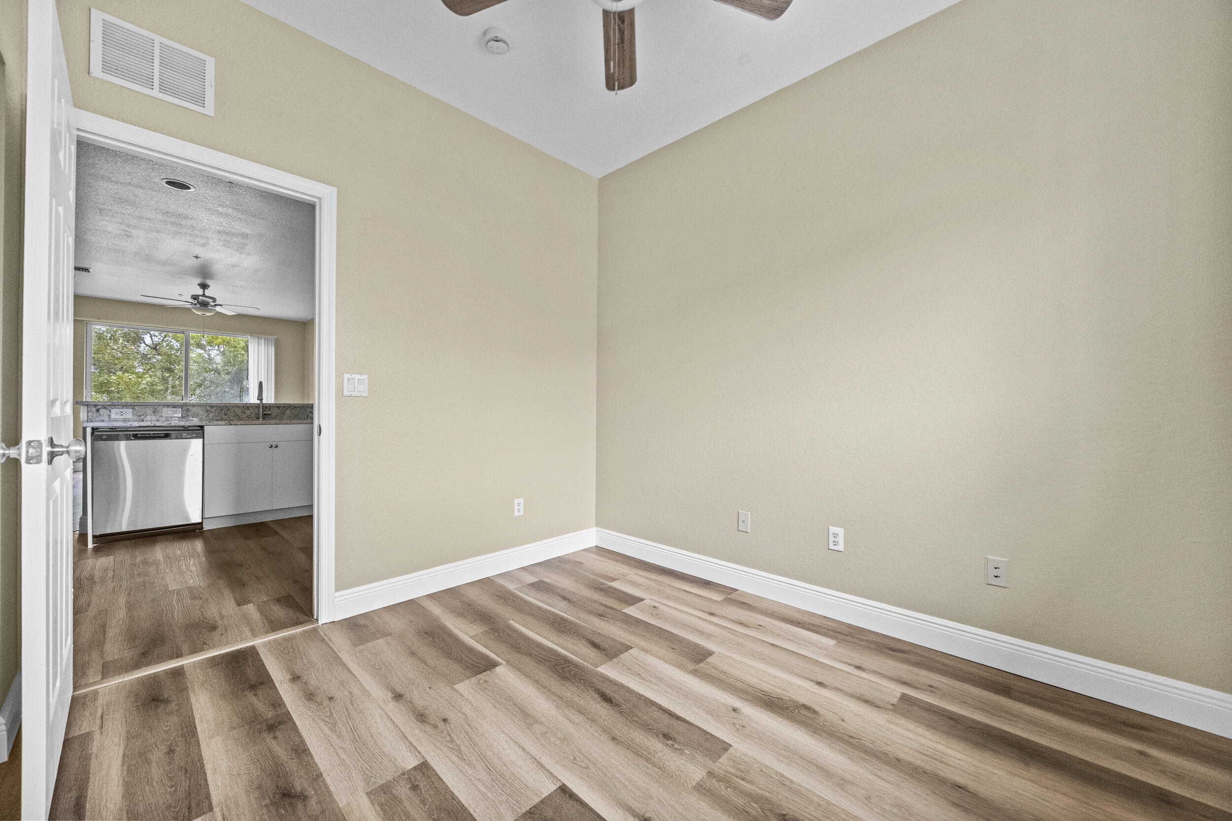 1982 Freeport Drive Riviera Beach, FL 33404 - Photo 9 of 31 a view of an empty room with a window