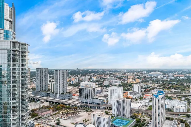 a view of a city with tall buildings