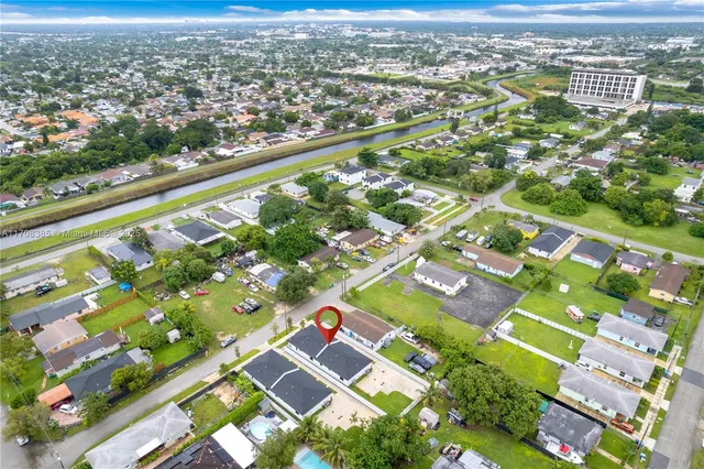 an aerial view of residential building with outdoor space