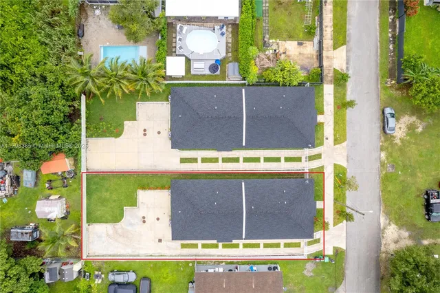 a view of swimming pool with a yard