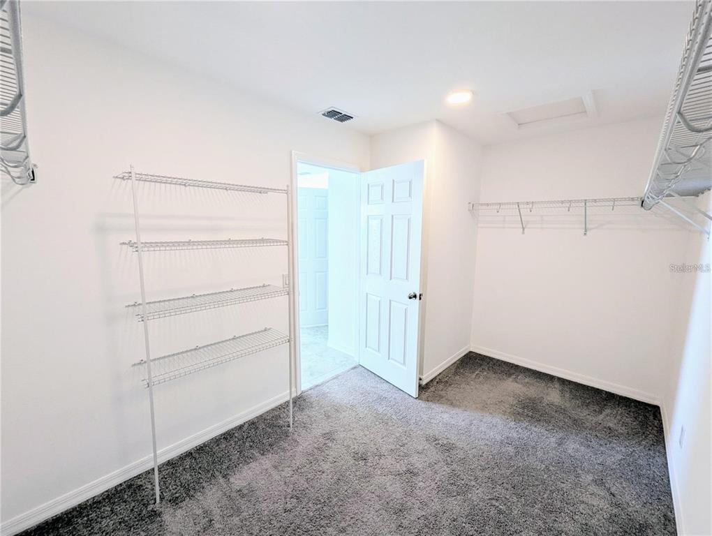 2944 Autumn Rock Drive Zephyrhills, FL 33540 - Photo 18 of 44 a view of an empty room