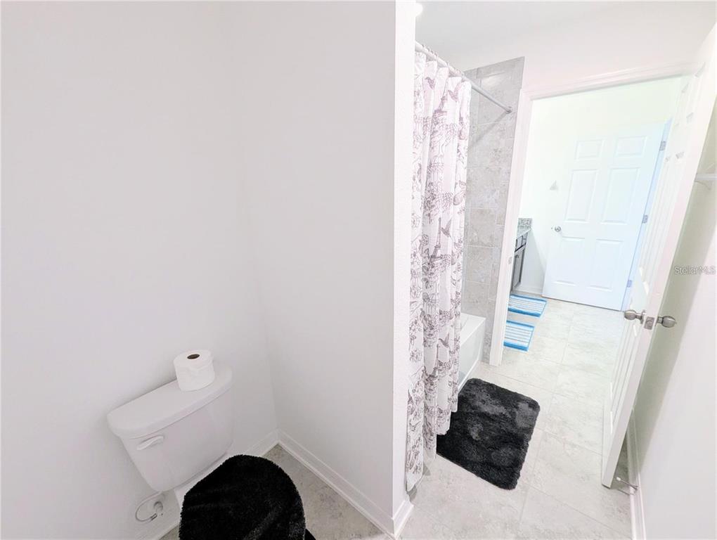 2944 Autumn Rock Drive Zephyrhills, FL 33540 - Photo 28 of 44 a room with a washer and dryer