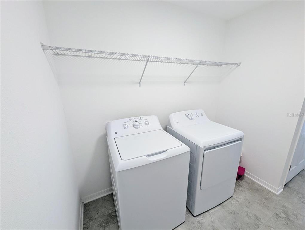2944 Autumn Rock Drive Zephyrhills, FL 33540 - Photo 30 of 44 a utility room with dryer and washer