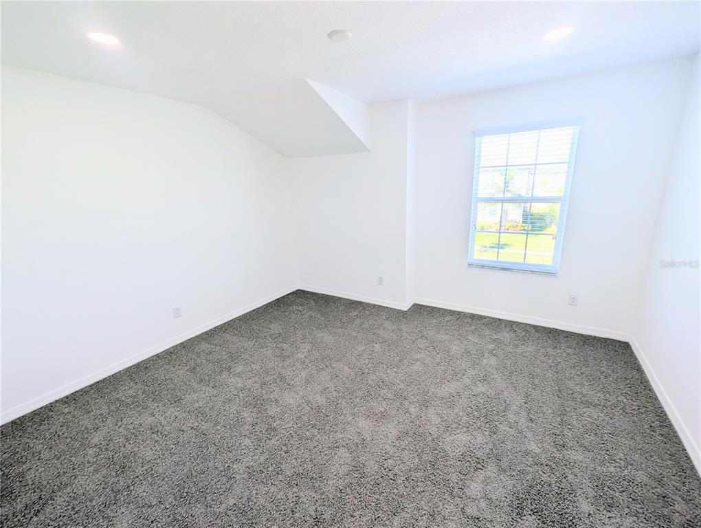 2944 Autumn Rock Drive Zephyrhills, FL 33540 - Photo 31 of 44 an empty room with a window