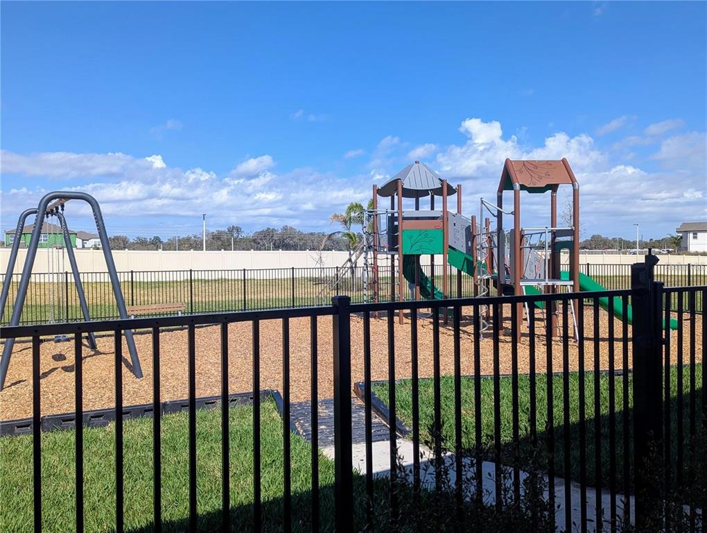 2944 Autumn Rock Drive Zephyrhills, FL 33540 - Photo 39 of 44 a view of a street from a balcony