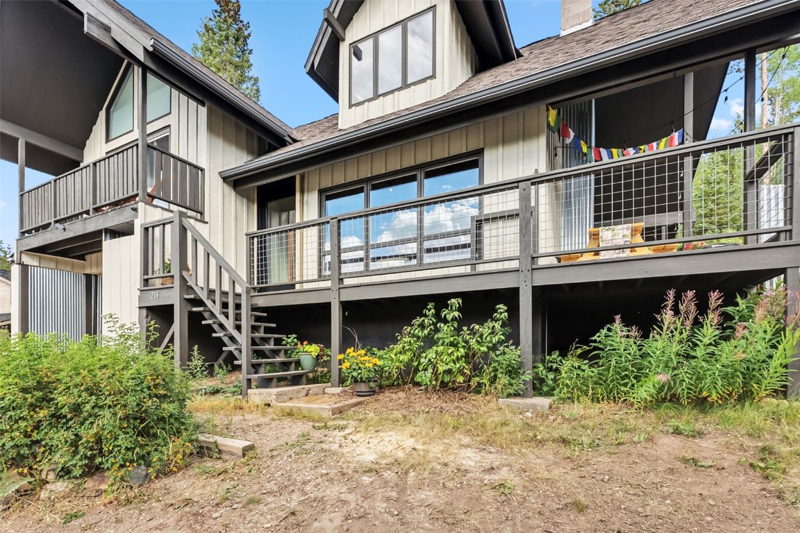 218 Deer Path Road Dillon, CO 80435 - Photo 1 of 49 a view of a house with a window and flower plants