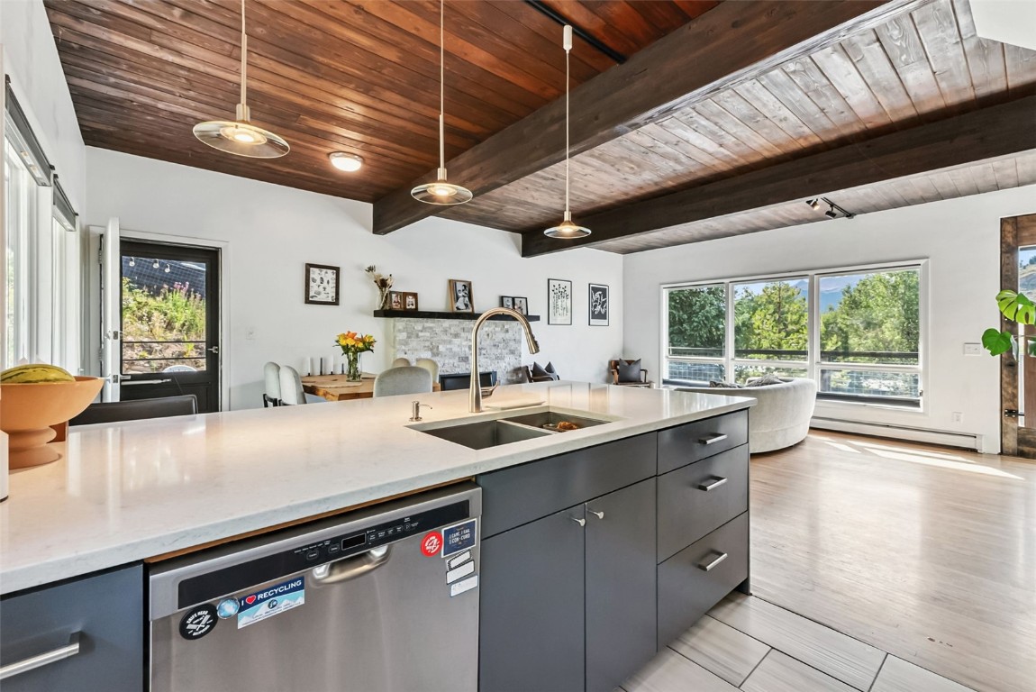 218 Deer Path Road Dillon, CO 80435 - Photo 12 of 49 a kitchen with a sink appliances and a large window