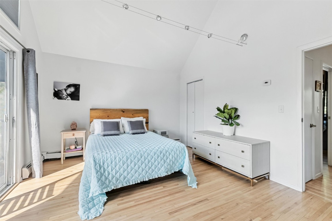 218 Deer Path Road Dillon, CO 80435 - Photo 18 of 49 a bedroom with a bed and a dresser