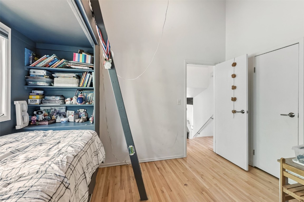 218 Deer Path Road Dillon, CO 80435 - Photo 22 of 49 a view of a hallway with wooden floor and staircase