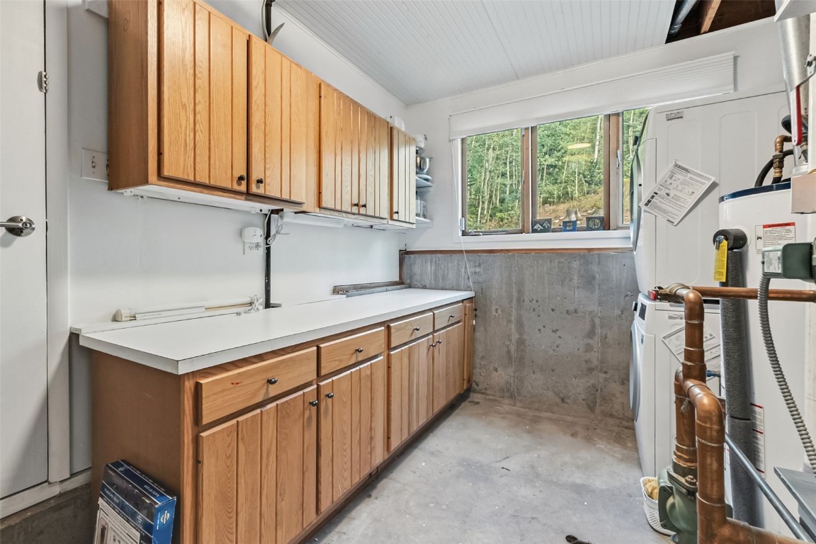 218 Deer Path Road Dillon, CO 80435 - Photo 30 of 49 a kitchen with a sink stove and microwave