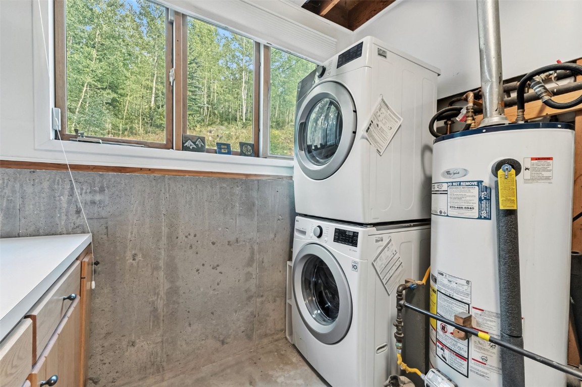 218 Deer Path Road Dillon, CO 80435 - Photo 31 of 49 a utility room with dryer and washer
