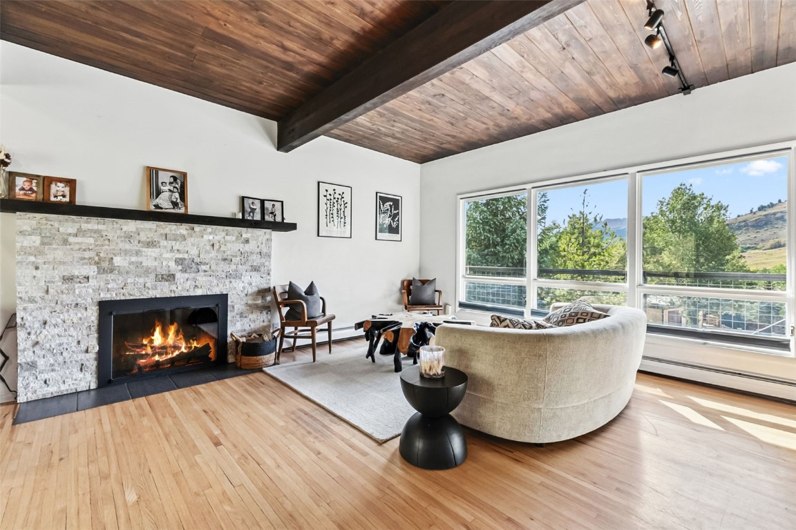 218 Deer Path Road Dillon, CO 80435 - Photo 8 of 49 a living room with furniture and a fireplace