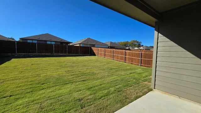 a view of outdoor space yard and front view of a house