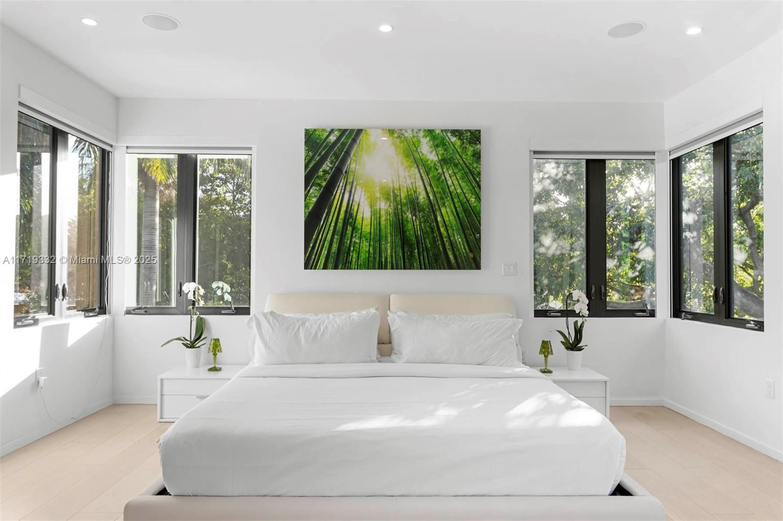 4301 Adams Avenue Miami Beach, FL 33140 - Photo 27 of 51 a bedroom with a large bed and a large window