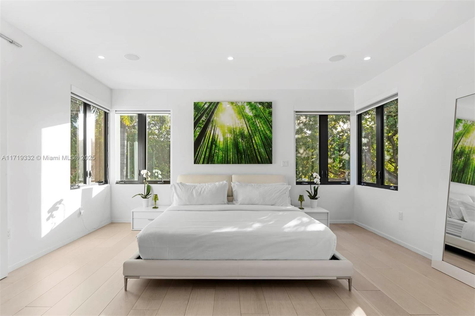 4301 Adams Avenue Miami Beach, FL 33140 - Photo 30 of 51 a spacious bedroom with a large bed and a large window