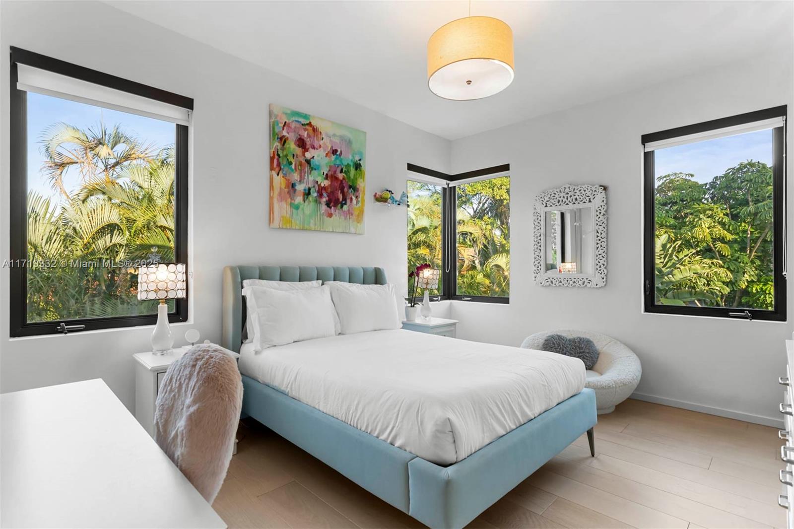 4301 Adams Avenue Miami Beach, FL 33140 - Photo 37 of 51 a bedroom with a bed and a painting on the wall