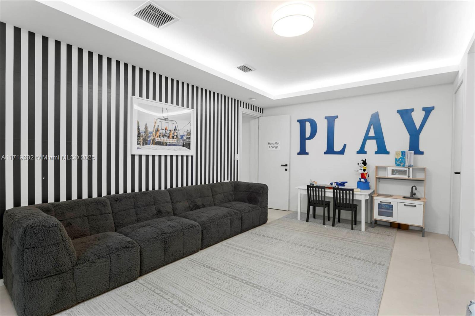 4301 Adams Avenue Miami Beach, FL 33140 - Photo 40 of 51 a living room with furniture and a dining table