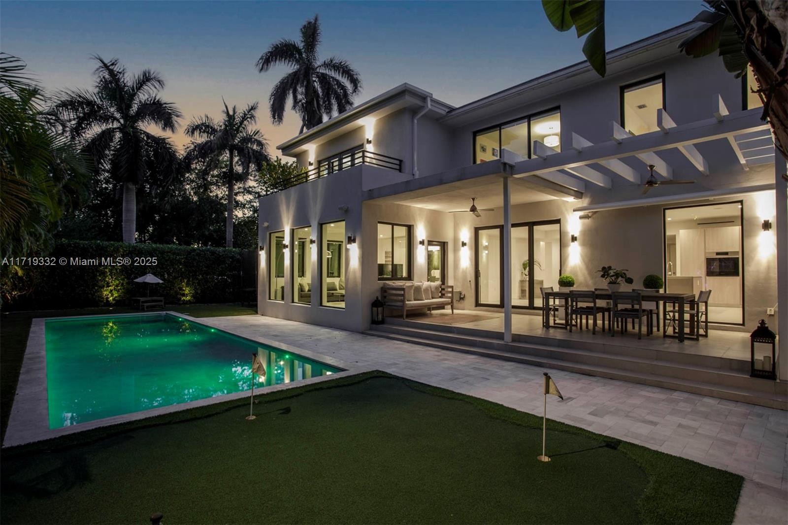 4301 Adams Avenue Miami Beach, FL 33140 - Photo 8 of 51 a view of a chairs and table in the patio