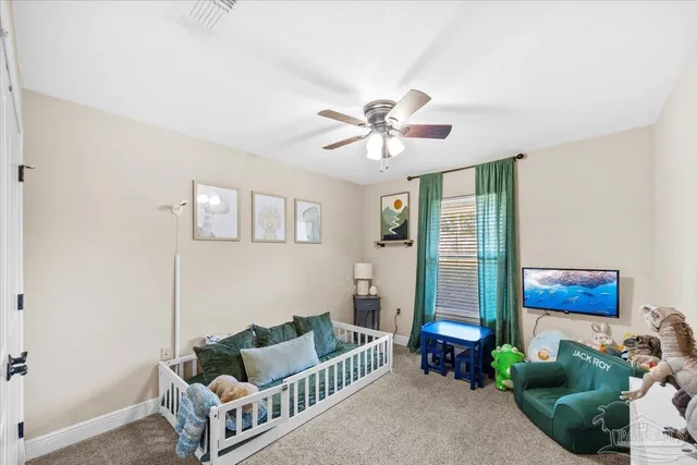 a bedroom with furniture and a chandelier