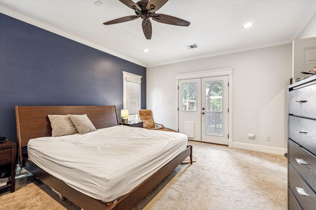 a bathroom with a double vanity sink a mirror and a shower