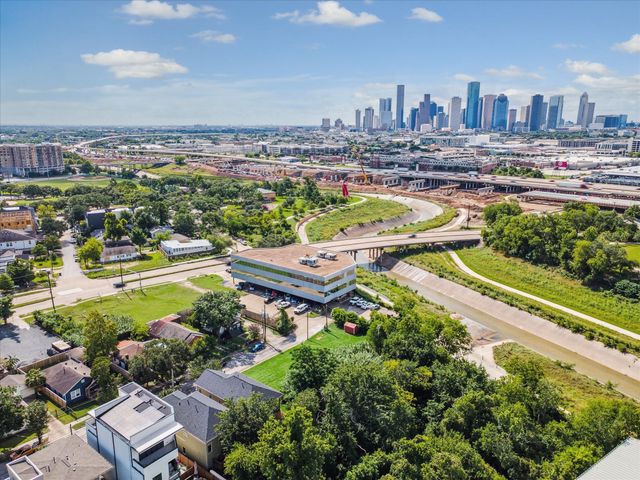 an aerial view of a house with a garden