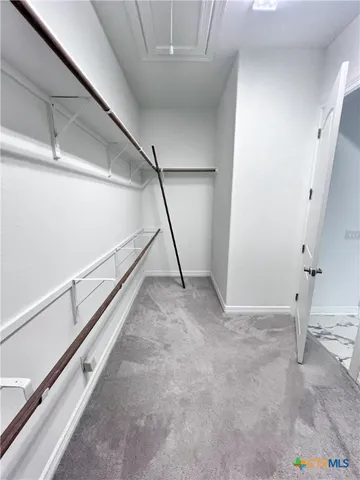 a view of a room with rack on the wall