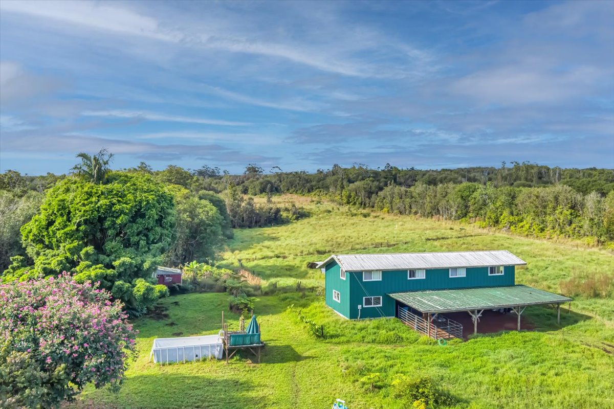 18-4327 North Peck Road Mountain View, HI 96771 - Photo 23 of 26 an aerial view of a house with a garden