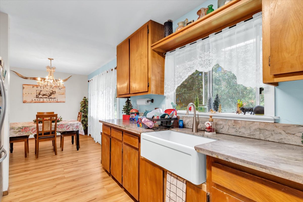 18-4327 North Peck Road Mountain View, HI 96771 - Photo 8 of 26 a kitchen with a sink appliances cabinets and a large window