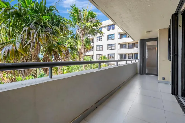 a view of balcony with a potted plant