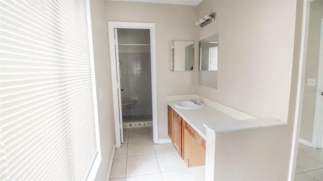 a utility room with a sink dryer and washer
