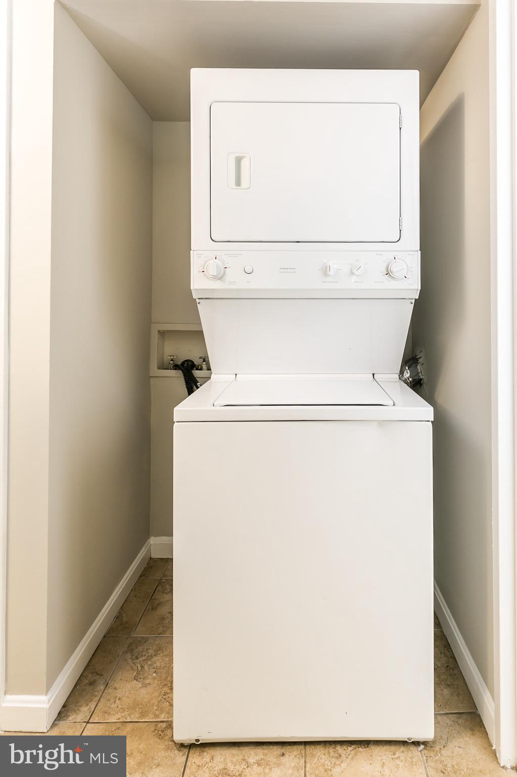 11650 Stoneview Square, Unit 11C Reston, VA 20191 - Photo 12 of 26 a utility room with dryer and washer