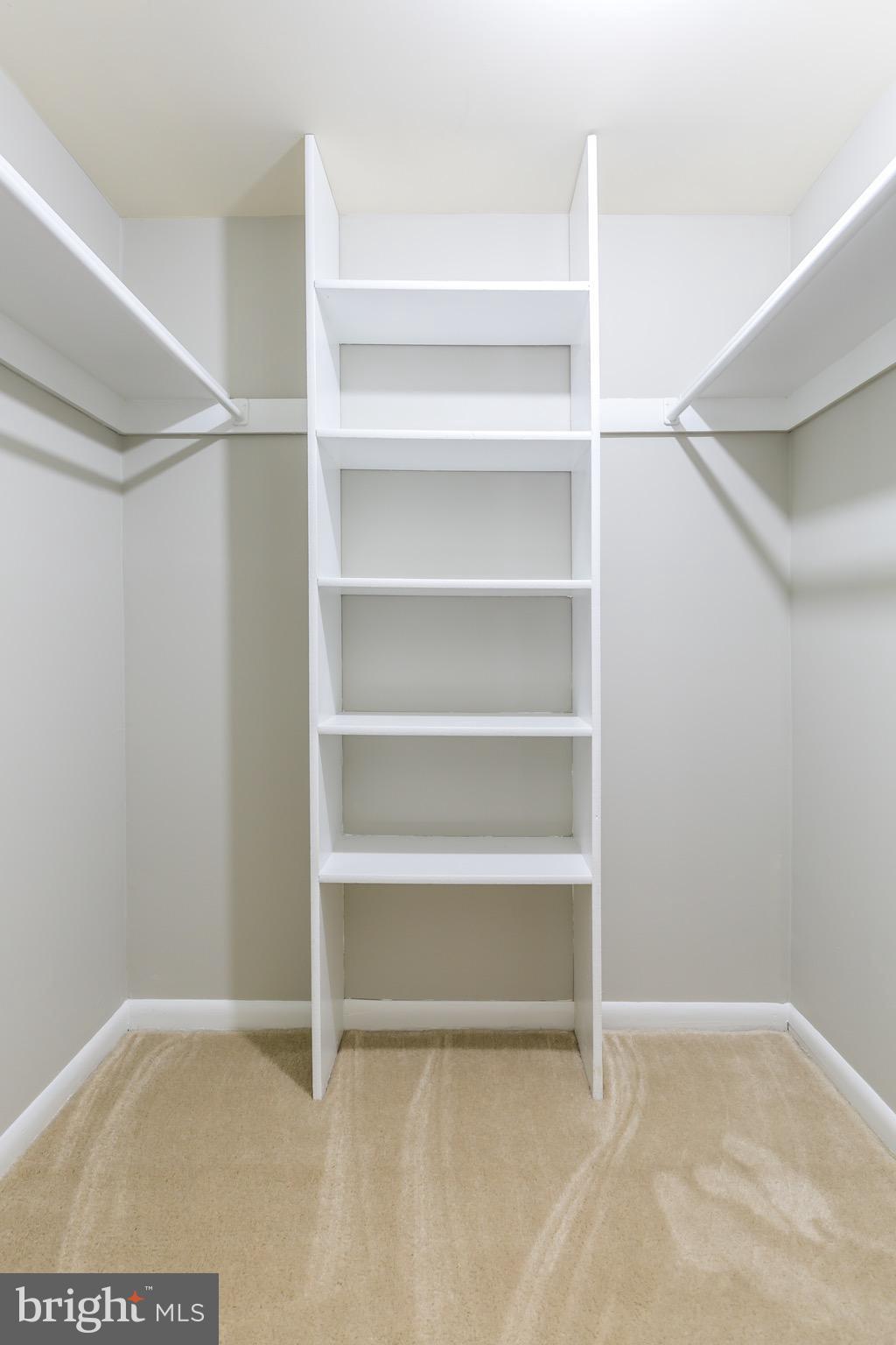 11650 Stoneview Square, Unit 11C Reston, VA 20191 - Photo 15 of 26 a view of an empty walk in closet