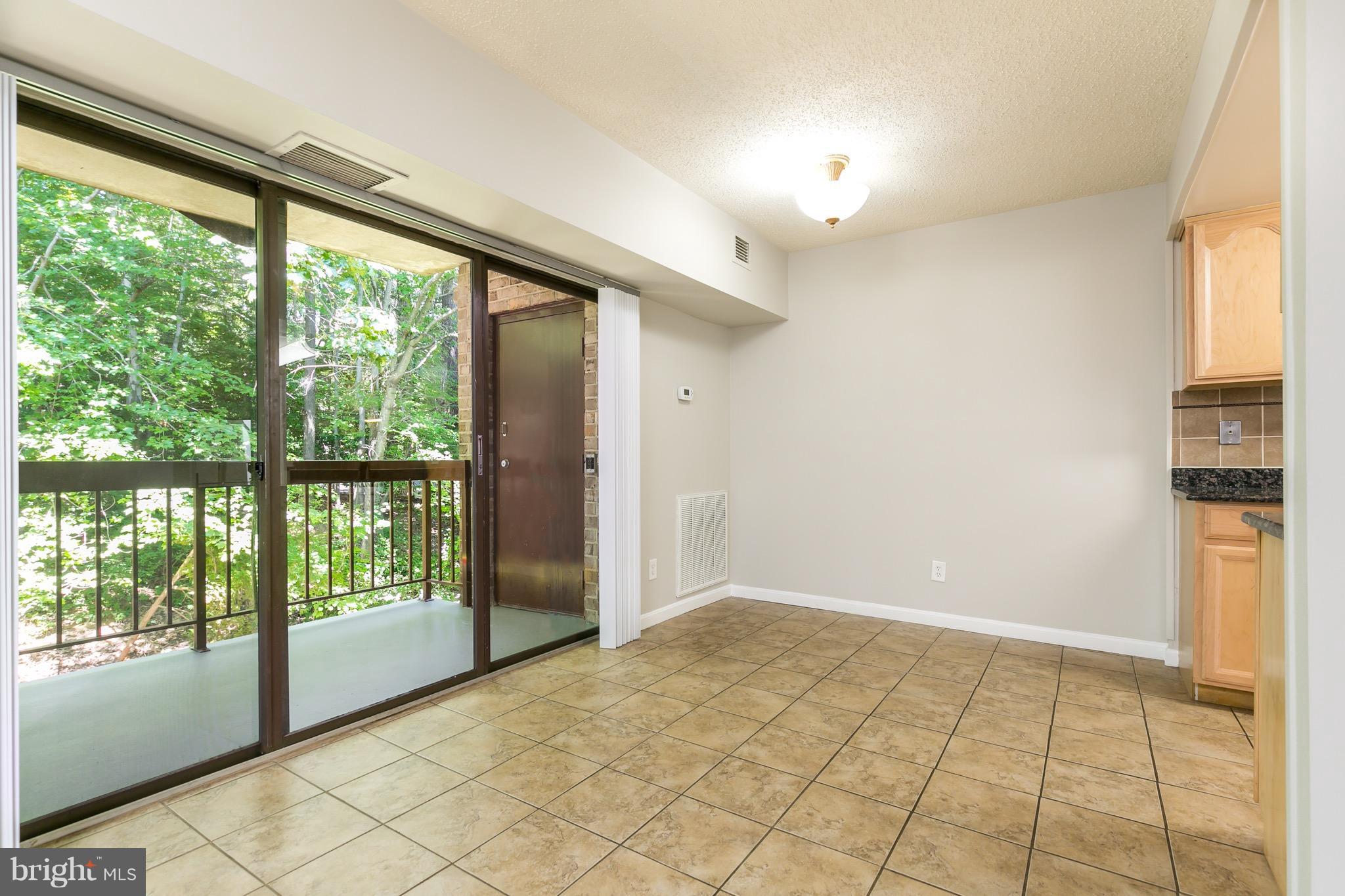 11650 Stoneview Square, Unit 11C Reston, VA 20191 - Photo 20 of 26 a view of an empty room and window