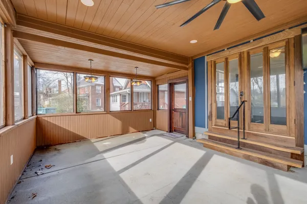 a view of an empty room and window