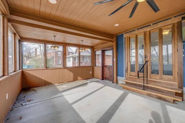 a view of an empty room and window
