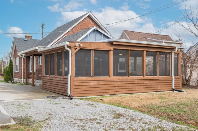 a view of a house with a small garden