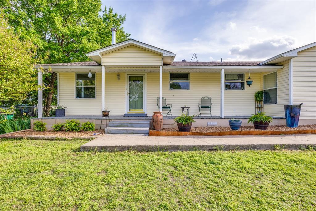 4440 Dripping Spring Road Sherman, TX 75090 - Photo 2 of 39 front view of a house with a yard