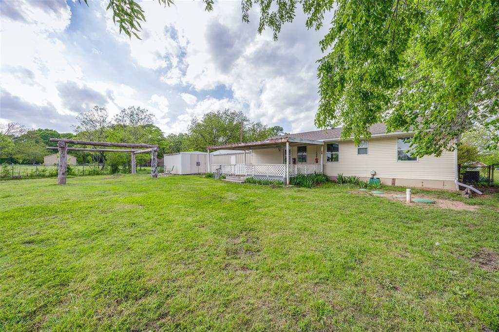 4440 Dripping Spring Road Sherman, TX 75090 - Photo 25 of 39 a view of house with a big yard