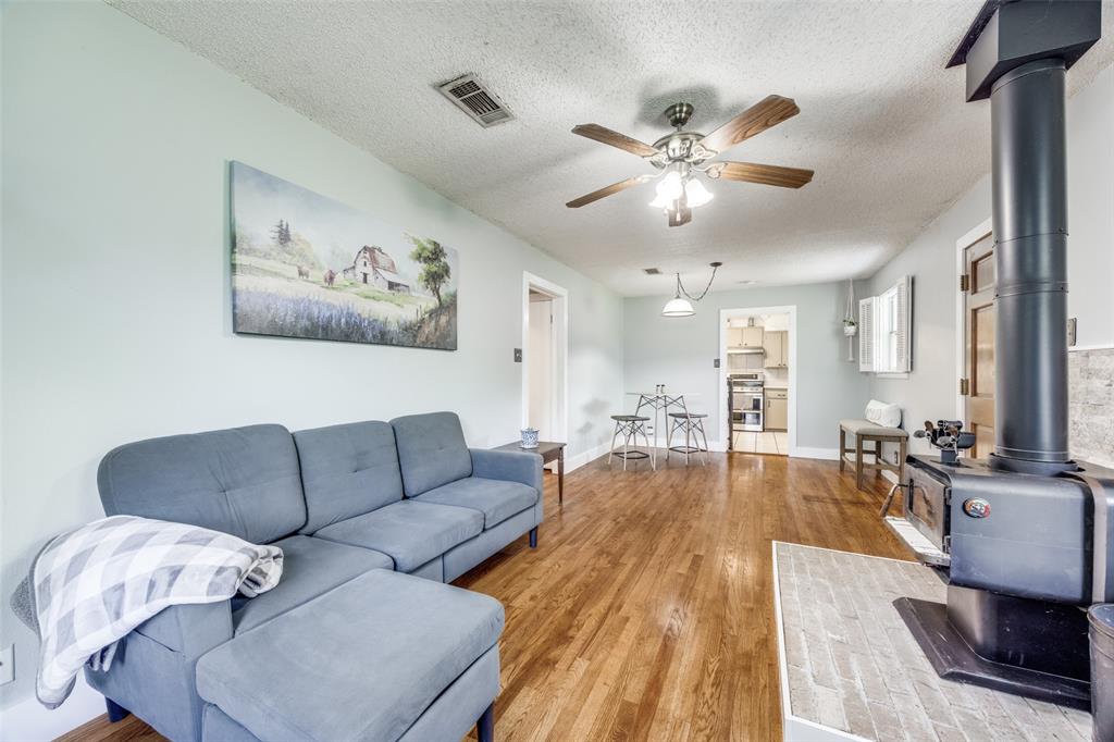 4440 Dripping Spring Road Sherman, TX 75090 - Photo 5 of 39 a living room with furniture and a large window