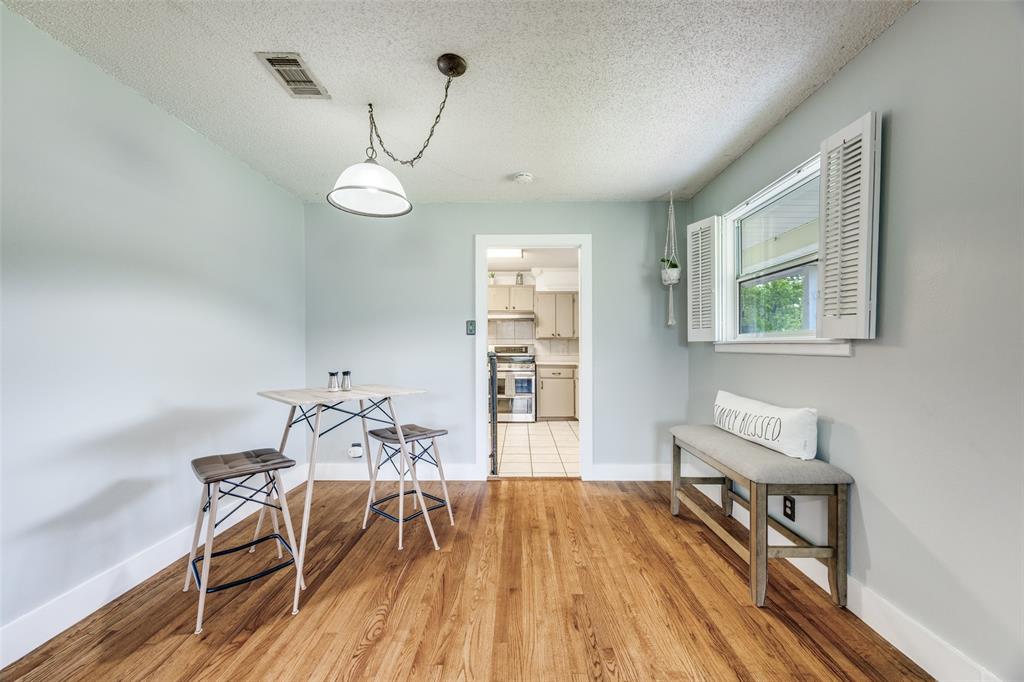 4440 Dripping Spring Road Sherman, TX 75090 - Photo 6 of 39 a view of a room with furniture wooden floor and windows