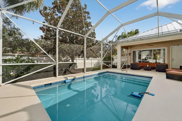 a view of a balcony with dining area