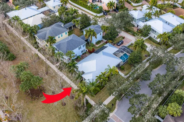an aerial view of a building with swimming pool