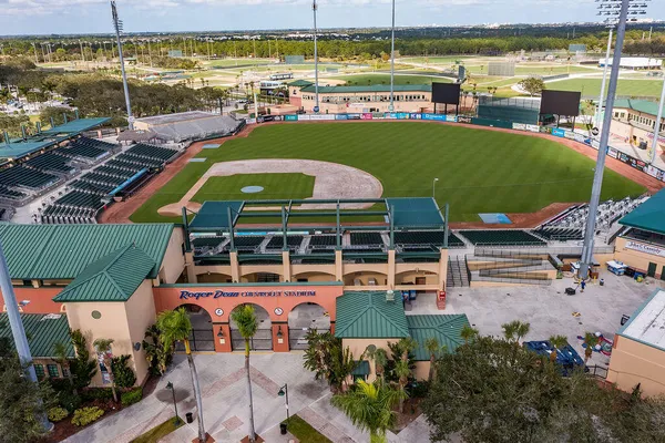 an aerial view of a house with outdoor space