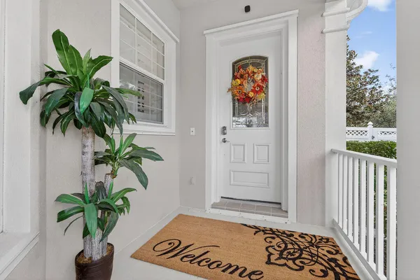 a view of entryway with wooden floor