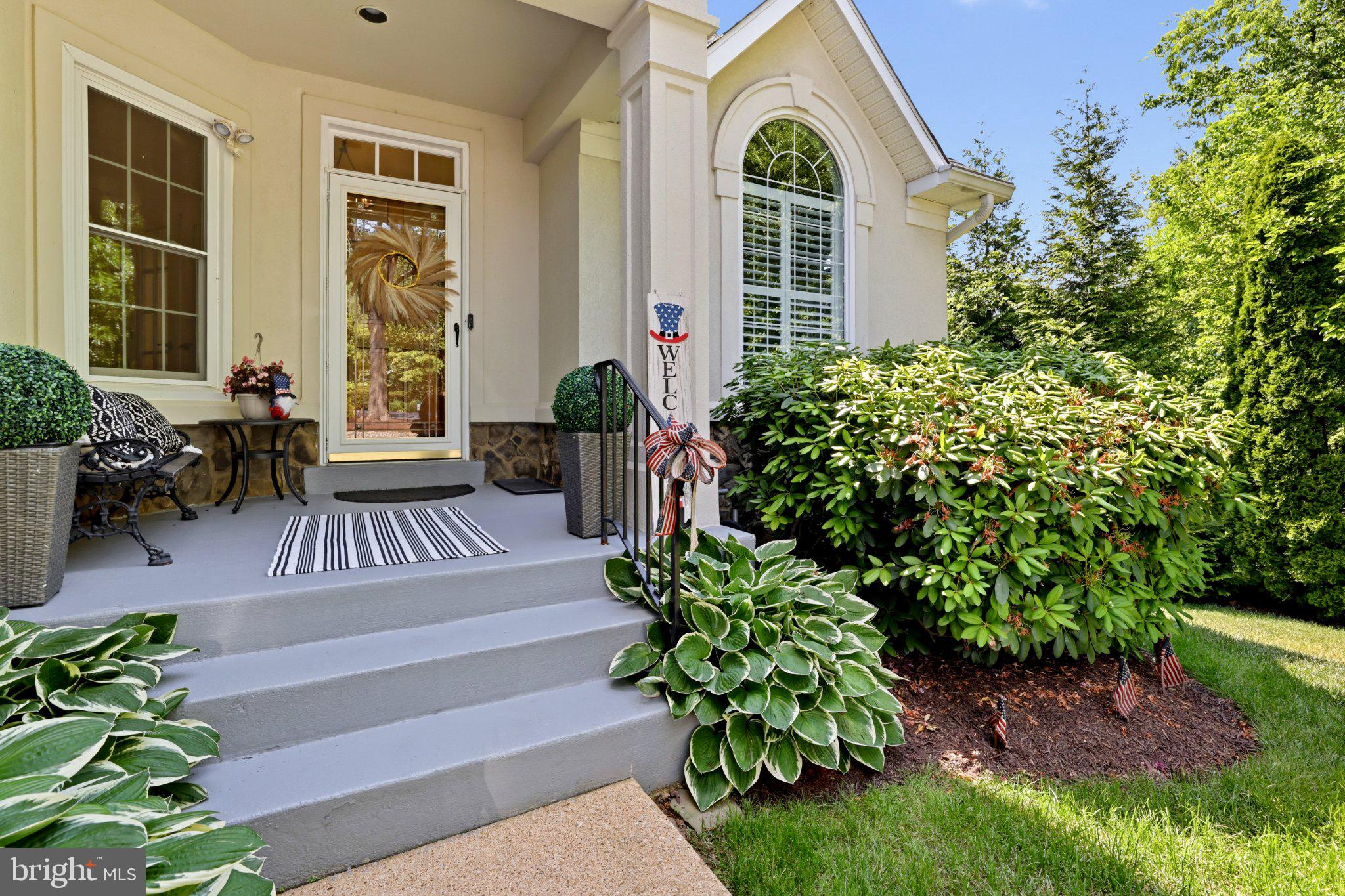 6732 Churchill Road McLean, VA 22101 - Photo 2 of 61 Charming entrance with lush greenery.